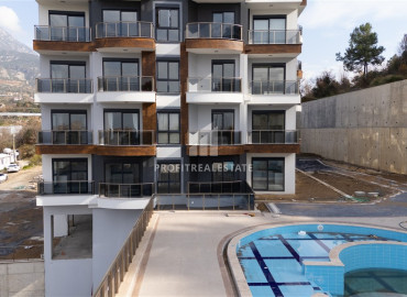 Квартира с одной спальней, 50м², с личным садом в новой элитной резиденции в Махмутларе, Алания ID-19520 фото-19