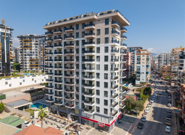 Apartment 1+1, 2+1 and 4+1-dublex, 49-163m², in a residence under construction in Mahmutlar, Alanya, 500m from the sea ID-11594 фото-1