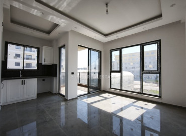 Квартира с одной спальней, 55м², в новом комплексе с бассейном в 500м от моря в Каргыджаке, Алания ID-19525 фото-4