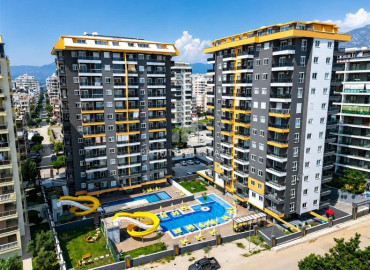 Новая трехкомнатная квартира, 72м², в комплексе премиум класса в районе Махмутлар, Алания ID-19528 фото-1