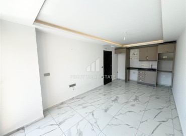Новая трехкомнатная квартира, 72м², в комплексе премиум класса в районе Махмутлар, Алания ID-19528 фото-2
