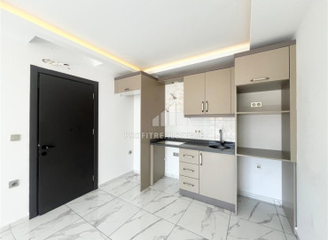 Новая трехкомнатная квартира, 72м², в комплексе премиум класса в районе Махмутлар, Алания ID-19528 фото-3