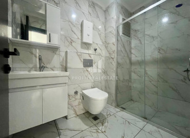 Новая трехкомнатная квартира, 72м², в комплексе премиум класса в районе Махмутлар, Алания ID-19528 фото-6