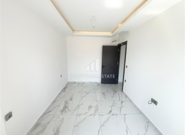 Новая трехкомнатная квартира, 72м², в комплексе премиум класса в районе Махмутлар, Алания ID-19528 фото-8