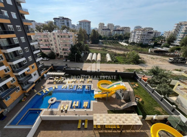 Новая трехкомнатная квартира, 72м², в комплексе премиум класса в районе Махмутлар, Алания ID-19528 фото-11