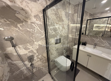 Стильная меблированная квартира с двумя спальнями, 95м², в новом комплексе с бассейном у пляжа Клеопатры, Алания ID-19534 фото-7
