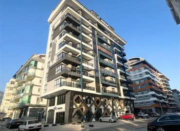 Апартаменты с одной спальней, 58м², в комфортабельном комплексе в 400м от моря в Махмутларе, Алания ID-19539 фото-1