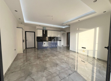 Апартаменты с одной спальней, 58м², в комфортабельном комплексе в 400м от моря в Махмутларе, Алания ID-19539 фото-4