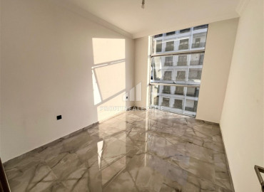 Апартаменты с одной спальней, 58м², в комфортабельном комплексе в 400м от моря в Махмутларе, Алания ID-19539 фото-7