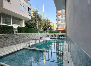 Апартаменты с одной спальней, 58м², в комфортабельном комплексе в 400м от моря в Махмутларе, Алания ID-19539 фото-12