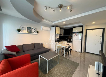 Готовая к проживанию, квартира 1+1, 65м², в резиденции с бассейном у моря в районе Махмутлар, Алания ID-19540 фото-3