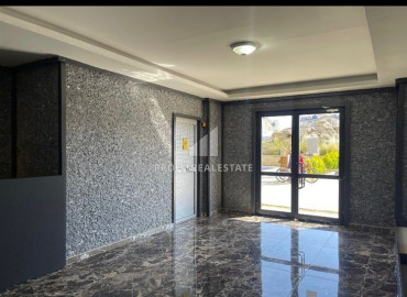 Квартира с одной спальней, 50м², в новом комплексе с бассейном в 500м от моря в Каргыджаке, Алания ID-19551 фото-17