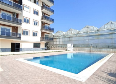 Квартира с одной спальней, 50м², в новом комплексе с бассейном в 500м от моря в Каргыджаке, Алания ID-19551 фото-20