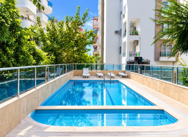 Квартира 1+1, 65м², с мебелью и бытовой техникой в комплексе с бассейном в 400м от моря в Махмутларе, Алания ID-19556 фото-8