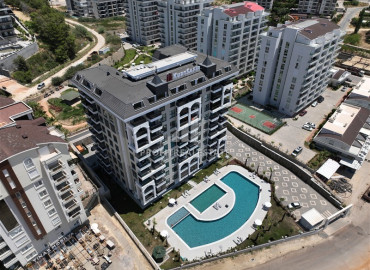 Двухкомнатные апартаменты, 56м², с чистовой отделкой в новом комплексе премиум класса в Авсалларе, Алания ID-19562 фото-1