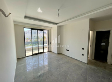 Двухкомнатные апартаменты, 56м², с чистовой отделкой в новом комплексе премиум класса в Авсалларе, Алания ID-19562 фото-3