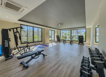 Двухкомнатные апартаменты, 56м², с чистовой отделкой в новом комплексе премиум класса в Авсалларе, Алания ID-19562 фото-11