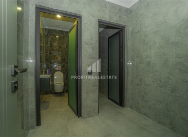 Двухкомнатные апартаменты, 56м², с чистовой отделкой в новом комплексе премиум класса в Авсалларе, Алания ID-19562 фото-14