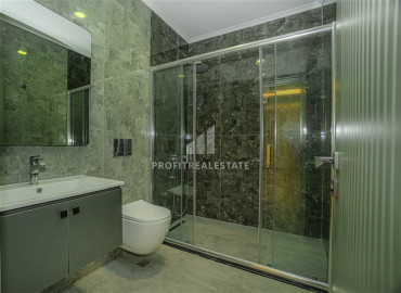 Двухкомнатные апартаменты, 56м², с чистовой отделкой в новом комплексе премиум класса в Авсалларе, Алания ID-19562 фото-15