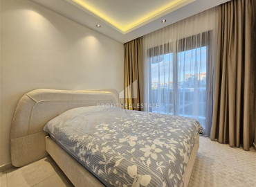 Дизайнерская квартира с одной спальней, 55м², в новостройке премиум класса в центре Махмутлара, Алания ID-19563 фото-9