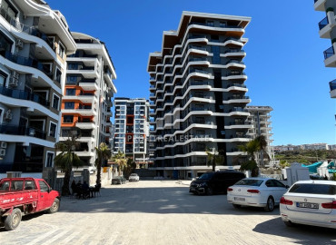 Дизайнерская квартира с одной спальней, 55м², в новостройке премиум класса в центре Махмутлара, Алания ID-19563 фото-20