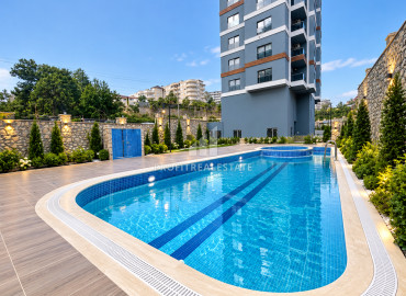 Квартира с одной спальней, 70м² в новом элитном комплексе, в Авсалларе, Алания, в 900м от пляжа Инджекум ID-19569 фото-1