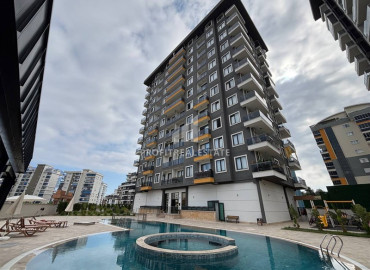 Уютные апартаменты 3+1 с отдельной кухней, 130м², в новом комплексе с отельной инфраструктурой, в Махмутларе, Алания ID-19574 фото-1