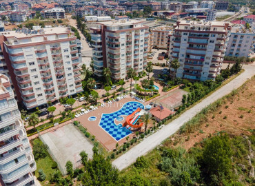 Уютная квартира с тремя спальнями, 120м², в престижном комплексе в 800м от моря в районе Алании Тосмур ID-19580 фото-1