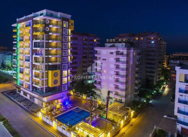 Уютная квартира с одной спальней, 55м², в комплексе с обширной инфраструктурой в 300м от моря в Махмутларе, Алания ID-19582 фото-1