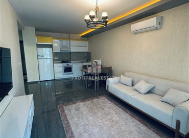 Уютная квартира с одной спальней, 55м², в комплексе с обширной инфраструктурой в 300м от моря в Махмутларе, Алания ID-19582 фото-2