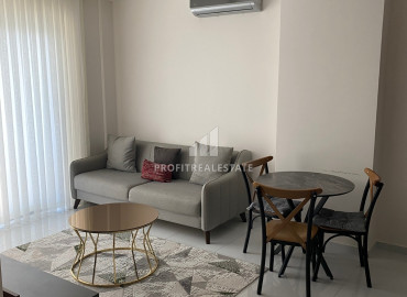Готовая к проживанию, квартира 1+1, 55м², в элитном комплексе в 500м от моря в Махмутларе, Алания ID-19583 фото-2