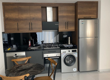Готовая к проживанию, квартира 1+1, 55м², в элитном комплексе в 500м от моря в Махмутларе, Алания ID-19583 фото-4