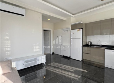 Видовая двухкомнатная квартира со стильным интерьером, 55м², в комплексе с отельной инфраструктурой в Махмутларе, Алания ID-19585 фото-5
