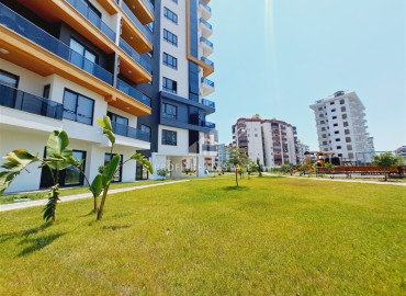 Видовая двухкомнатная квартира со стильным интерьером, 55м², в комплексе с отельной инфраструктурой в Махмутларе, Алания ID-19585 фото-14