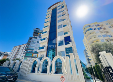 Меблированная двухкомнатная квартира, 54м², в комплексе премиум класса, в восточной части Махмутлара, Алания ID-19587 фото-1