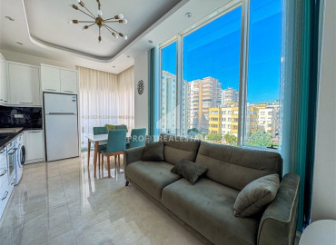 Меблированная двухкомнатная квартира, 54м², в комплексе премиум класса, в восточной части Махмутлара, Алания ID-19587 фото-2