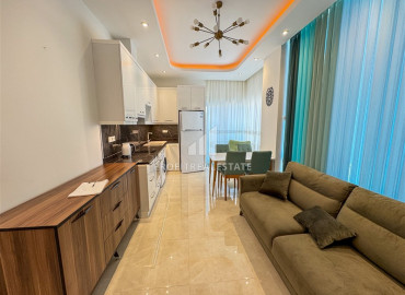 Меблированная двухкомнатная квартира, 54м², в комплексе премиум класса, в восточной части Махмутлара, Алания ID-19587 фото-5