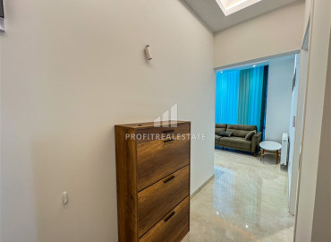 Меблированная двухкомнатная квартира, 54м², в комплексе премиум класса, в восточной части Махмутлара, Алания ID-19587 фото-9