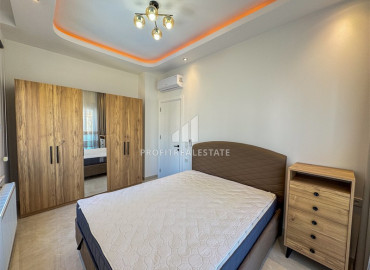 Меблированная двухкомнатная квартира, 54м², в комплексе премиум класса, в восточной части Махмутлара, Алания ID-19587 фото-15