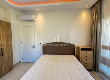 Меблированная двухкомнатная квартира, 54м², в комплексе премиум класса, в восточной части Махмутлара, Алания ID-19587 фото-16