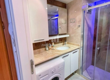 Меблированная двухкомнатная квартира, 50м², в современном комплексе у моря в центре Алании ID-19599 фото-4