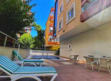 Меблированная двухкомнатная квартира, 50м², в современном комплексе у моря в центре Алании ID-19599 фото-11