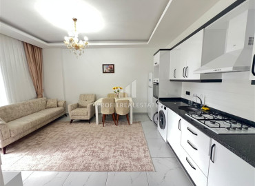 Двухкомнатная меблированная квартира, 61м², в комфортабельном комплексе у моря в Каргыджаке, Алания ID-19601 фото-1