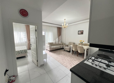 Двухкомнатная меблированная квартира, 61м², в комфортабельном комплексе у моря в Каргыджаке, Алания ID-19601 фото-4