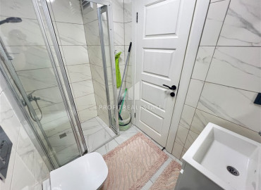 Двухкомнатная меблированная квартира, 61м², в комфортабельном комплексе у моря в Каргыджаке, Алания ID-19601 фото-7