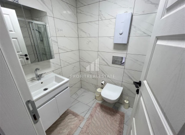 Двухкомнатная меблированная квартира, 61м², в комфортабельном комплексе у моря в Каргыджаке, Алания ID-19601 фото-8