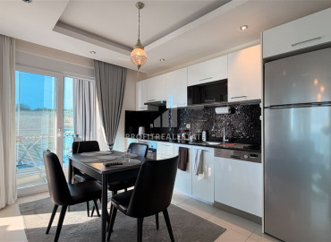 Уютная двухкомнатная квартира, 65м², в элитном комплексе в 200м от моря в районе Кестель, Алания ID-19605 фото-5