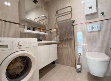 Уютная двухкомнатная квартира, 65м², в элитном комплексе в 200м от моря в районе Кестель, Алания ID-19605 фото-9