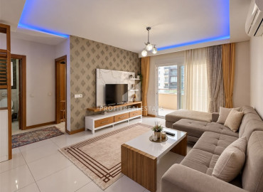 Элегантная двухкомнатная квартира, 65м² в комфортабельном комплексе в 450м от моря в Махмутларе, Алания ID-19606 фото-3