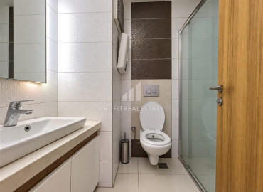 Элегантная двухкомнатная квартира, 65м² в комфортабельном комплексе в 450м от моря в Махмутларе, Алания ID-19606 фото-8